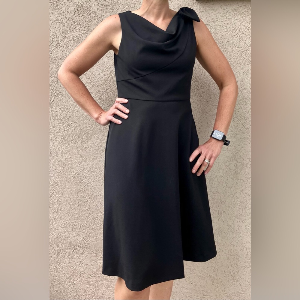 Black tank top dress. Bow on shoulder. DKNY size 6.